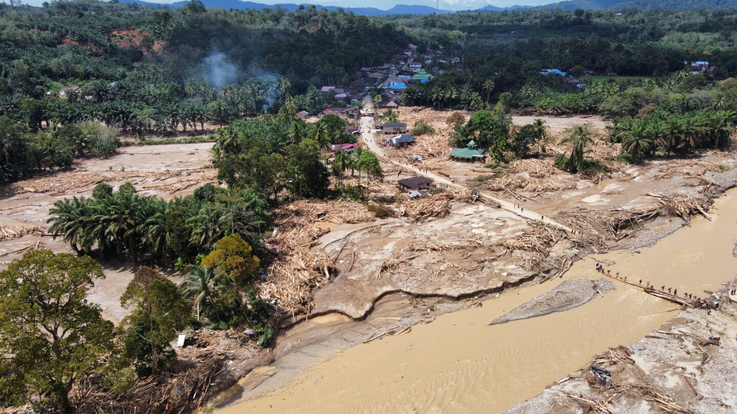 Deadly Asian floods are a preview of what's coming as climate warms, scientists say