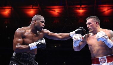 Oleksandr Usyk lands a left hand on Daniel Dubois during their heavyweight rematch at Wembley Stadium in London on July 19, 2025.