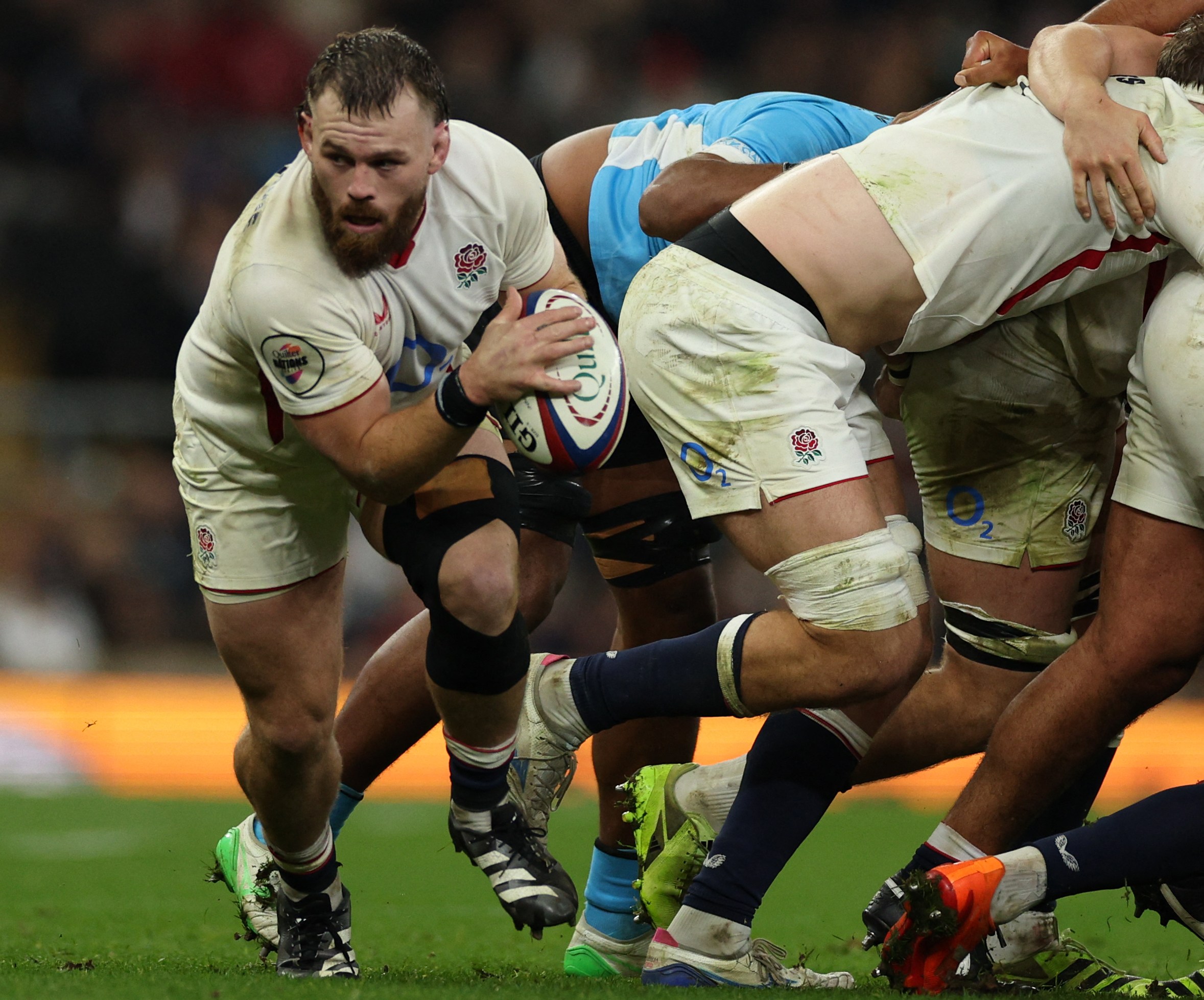 England's hooker Luke Cowan-Dickie makes a break during a rugby match.