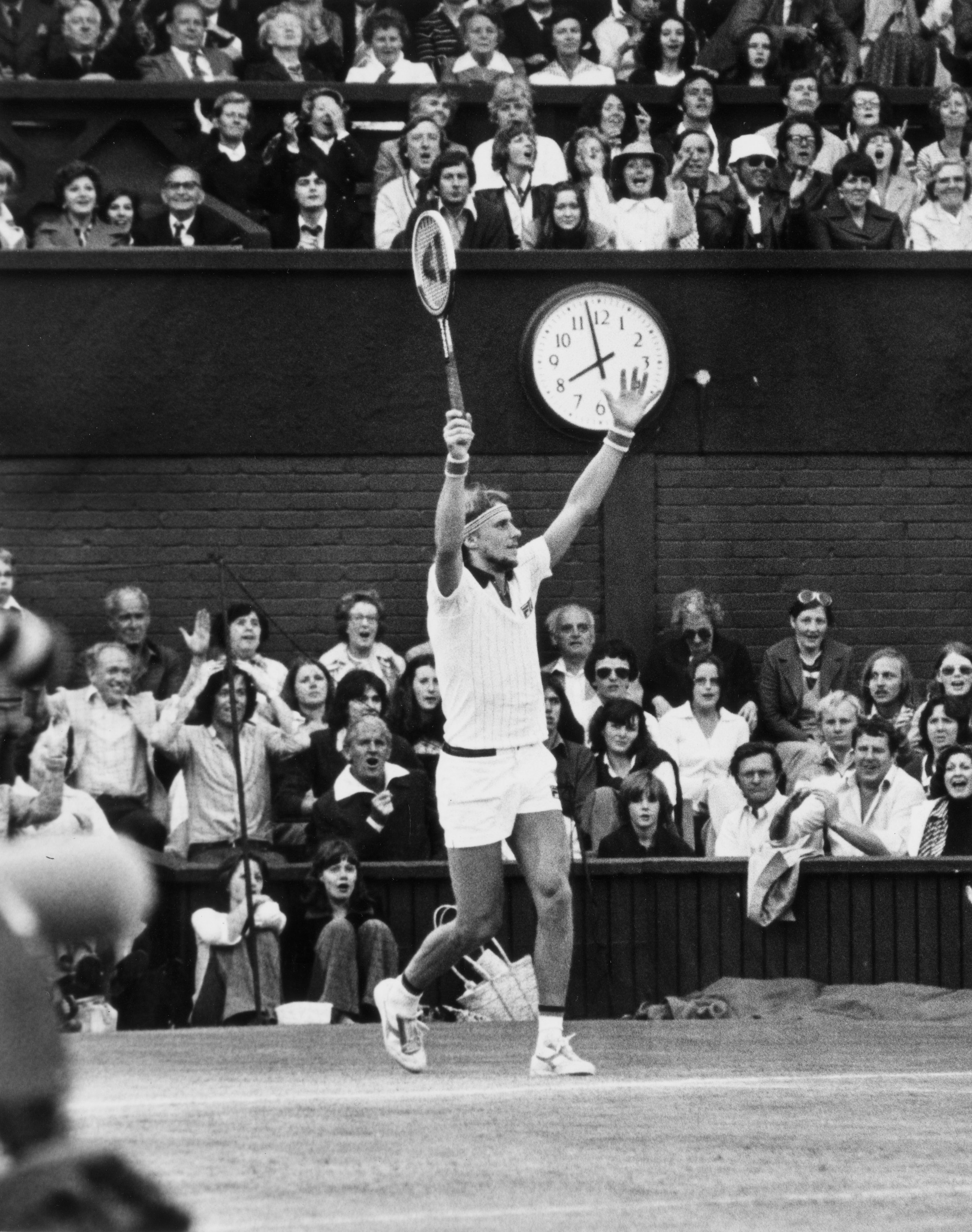 Bjorn Borg raises his arms in victory at the 1977 Wimbledon Men's Semi-Final.