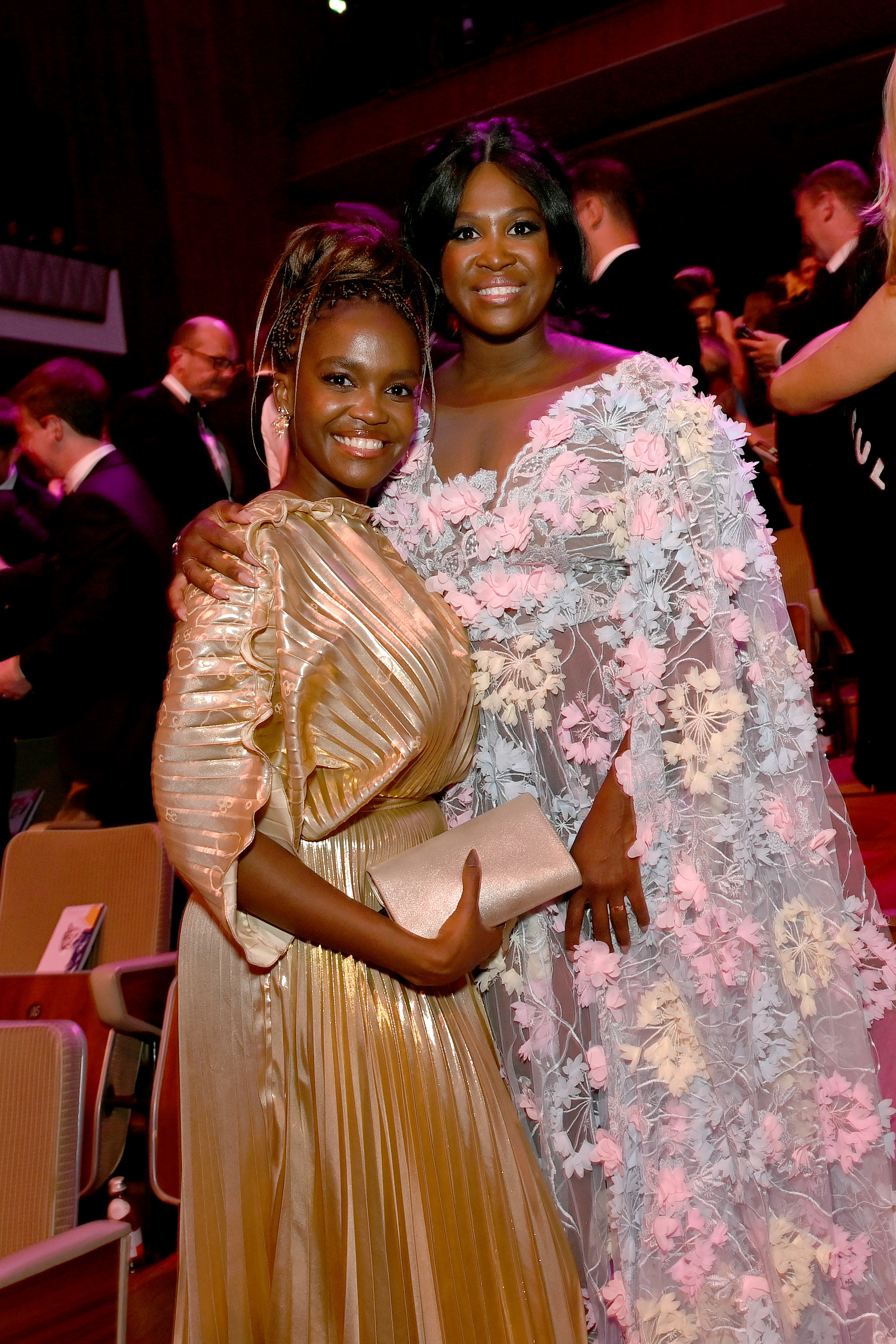 Oti Mabuse and Motsi Mabuse pose together at the BAFTA Television Awards.
