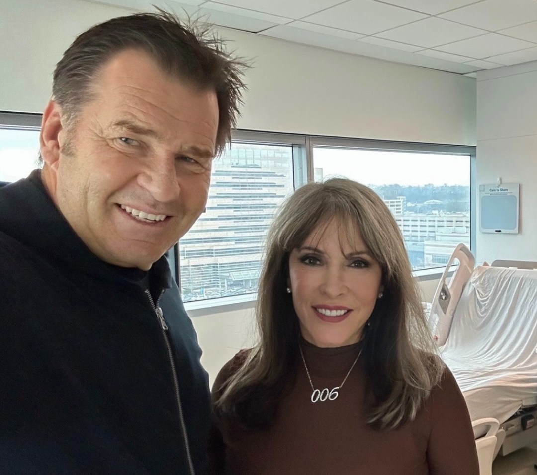 A man and a woman in a hospital room.