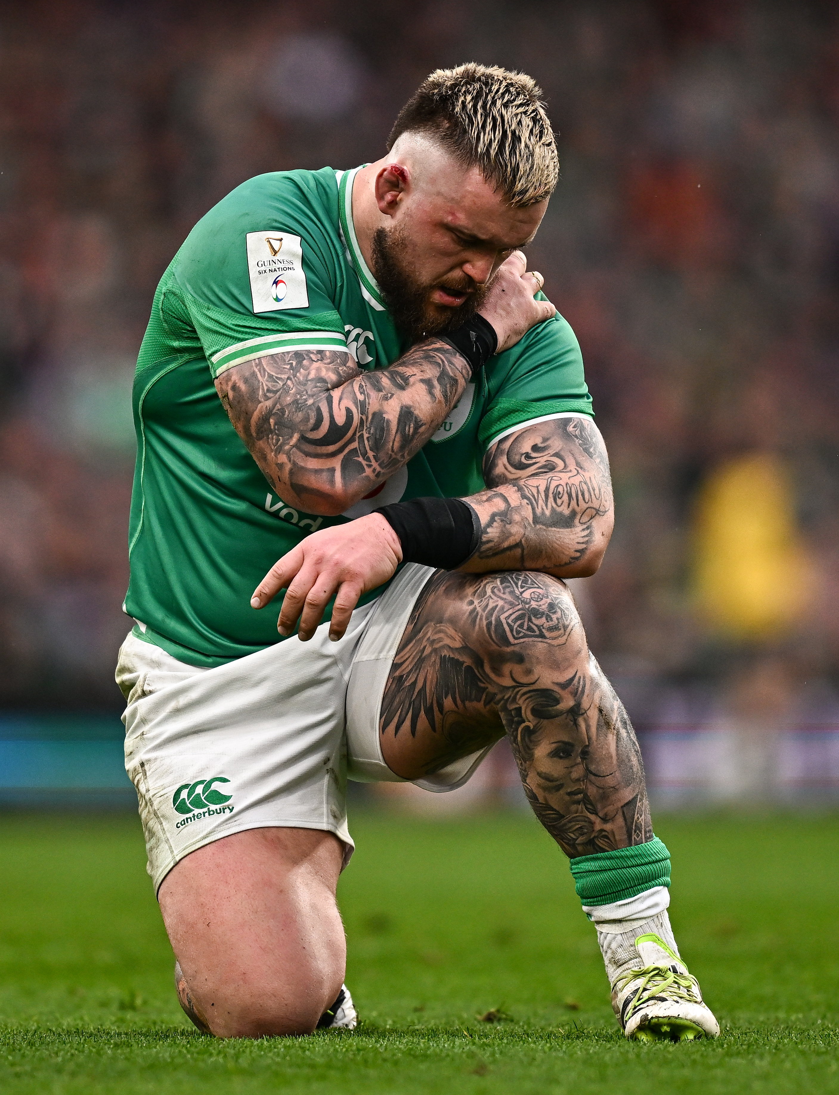 Andrew Porter of Ireland holds his shoulder during the Six Nations Rugby Championship match.