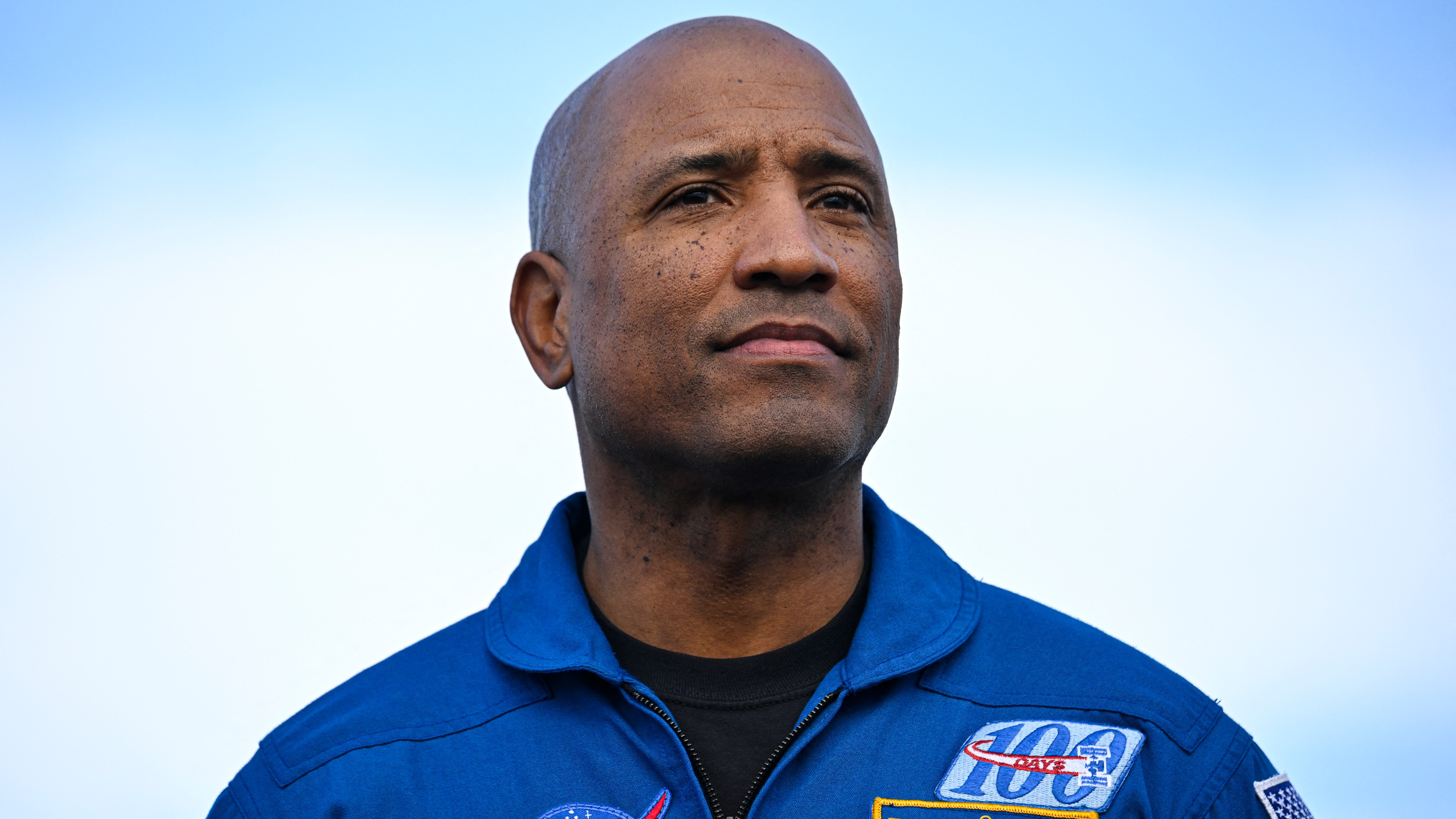 Artemis II pilot Victor Glover in his NASA flight suit.