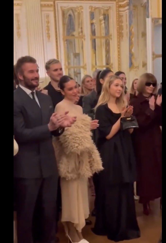 David Beckham and others applauding.
