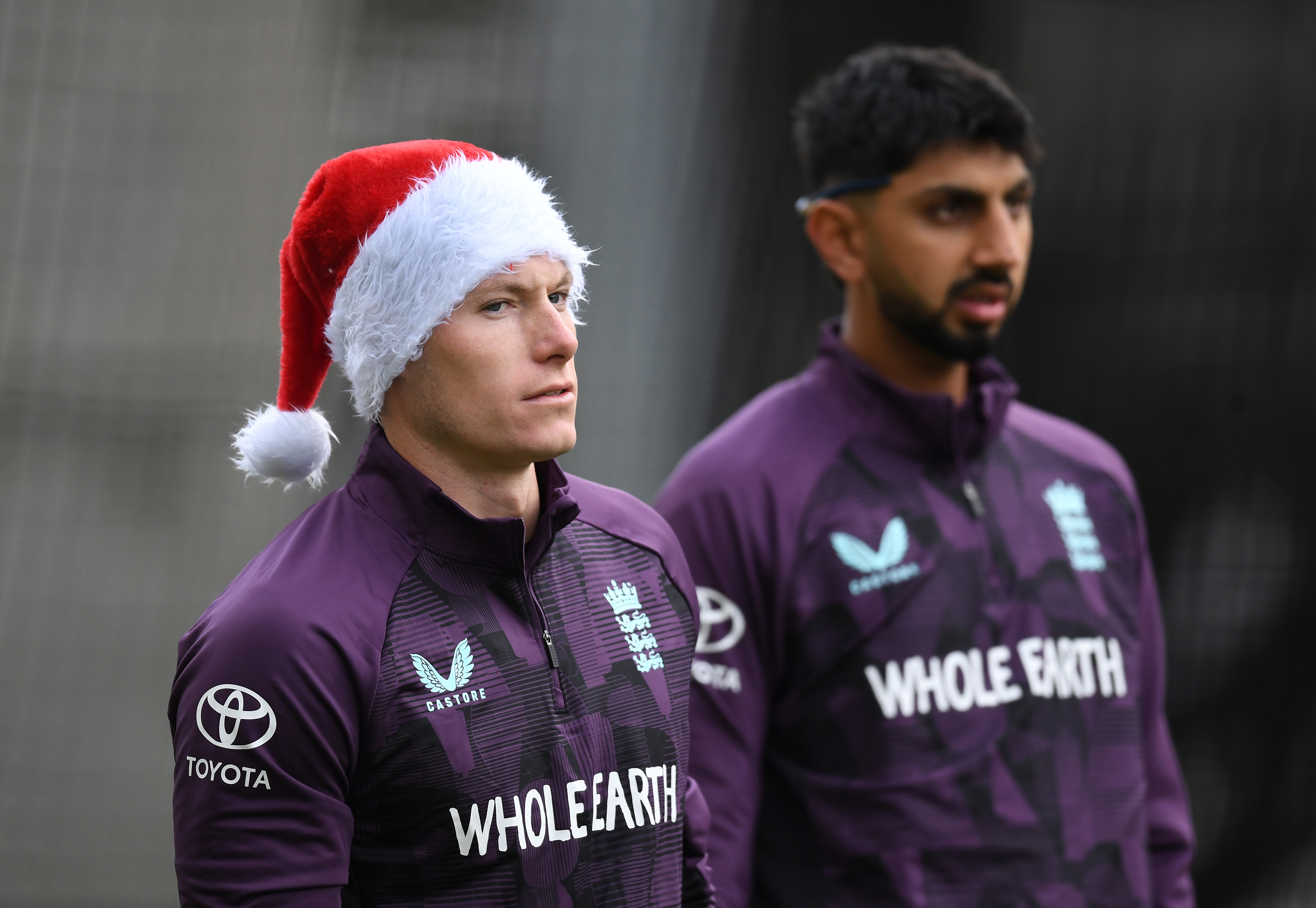 Matthew Potts (left) and Shoaib Bashir look on during an England nets session.