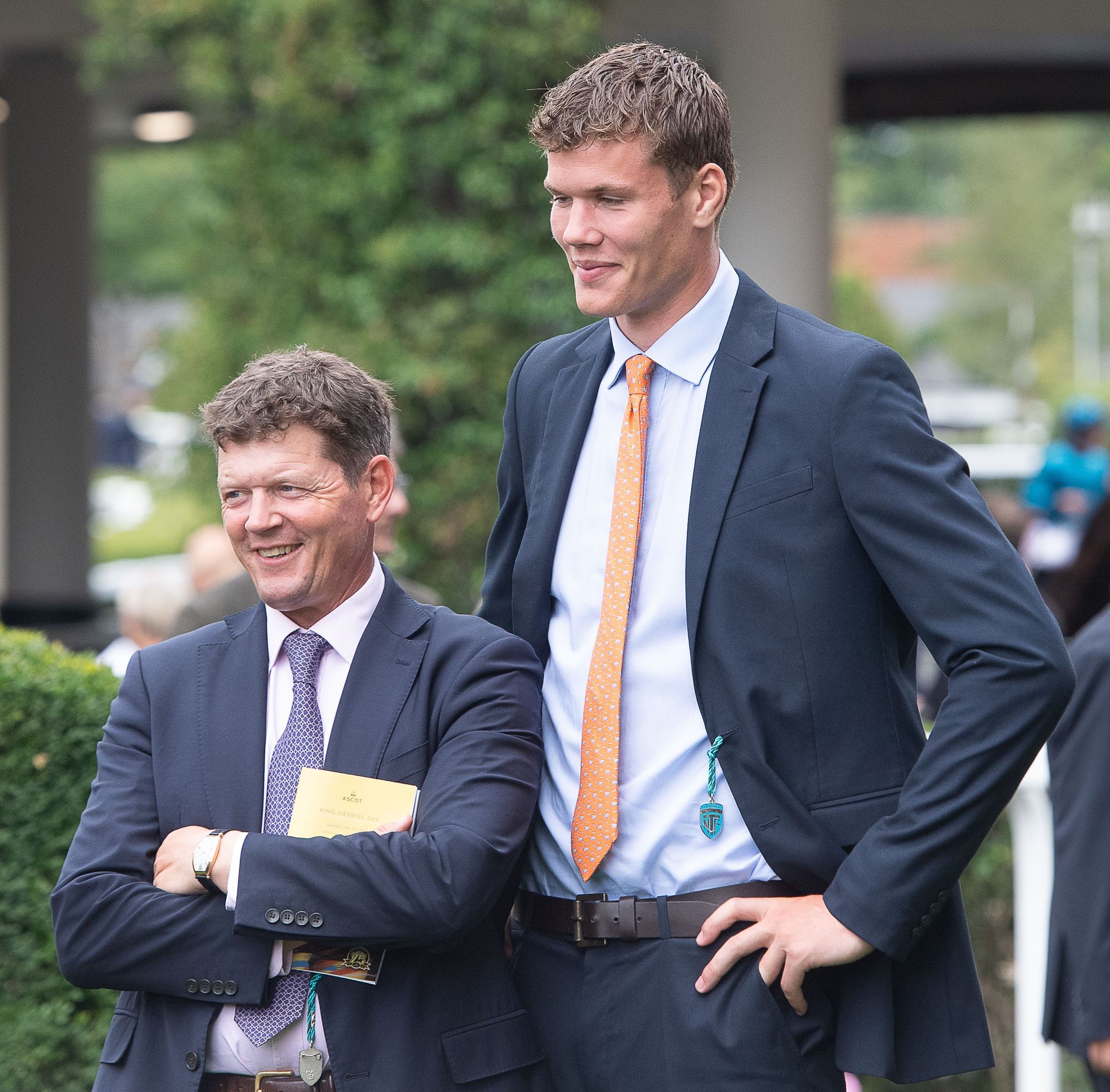 Trainer Andrew Balding and his son Jonno Balding in the parade ring at Ascot Racecourse.