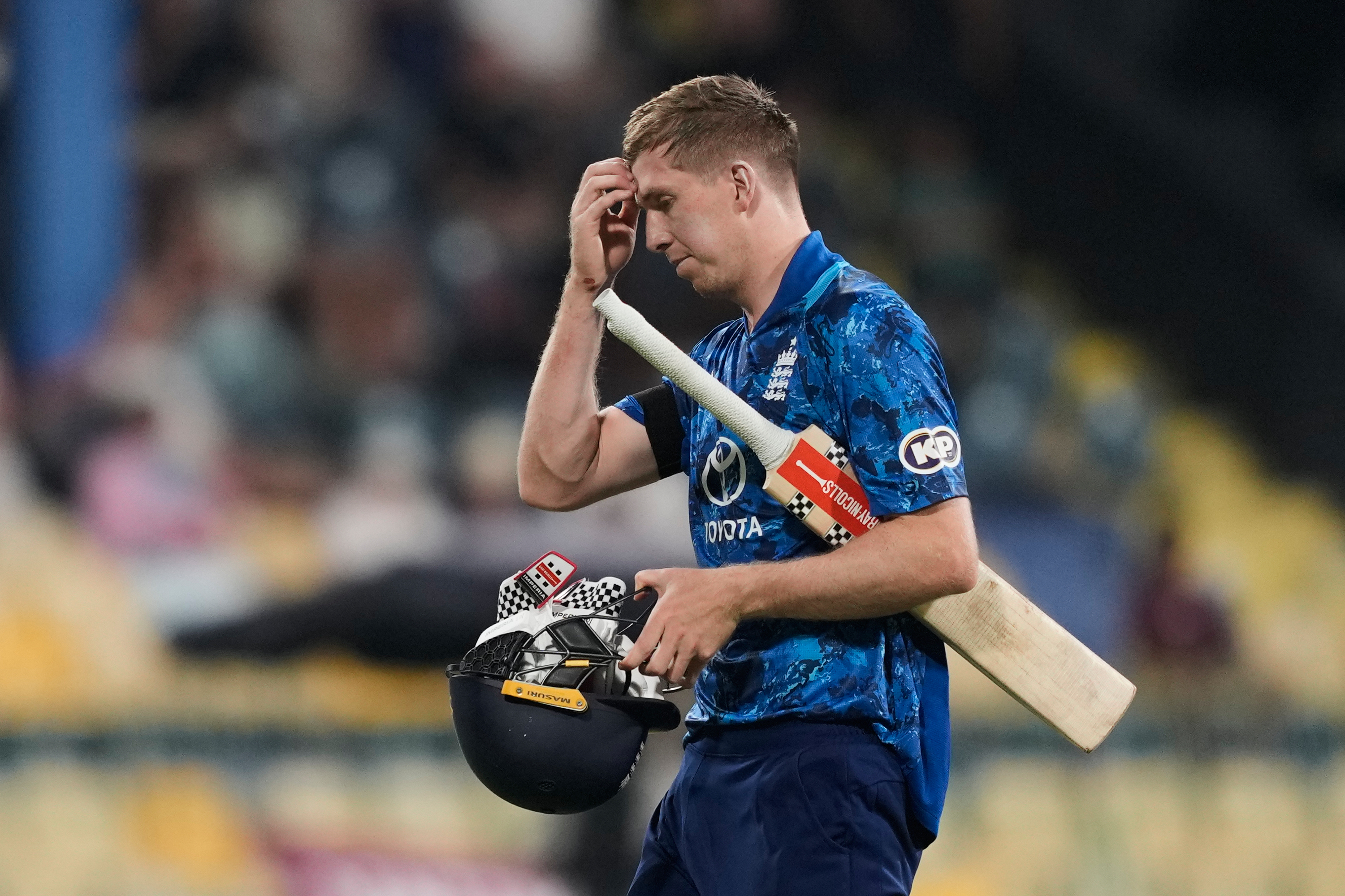 England's Zak Crawley leaves the ground after losing his wicket.