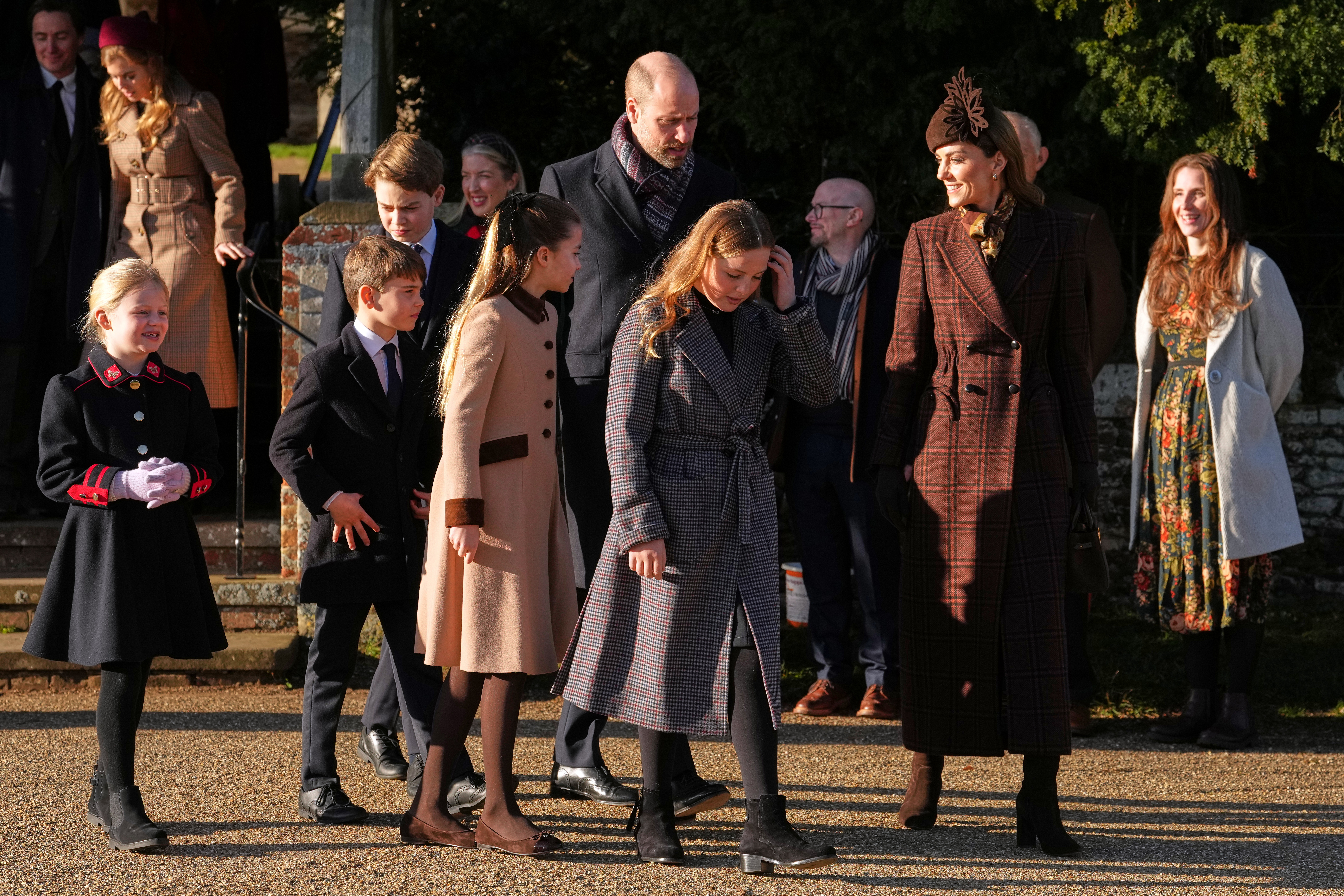 Prince William and Kate, Princess of Wales, with Lena Tindall, Prince Louis, Prince George, Princess Charlotte, and Mia Tindall after a Christmas Day service.