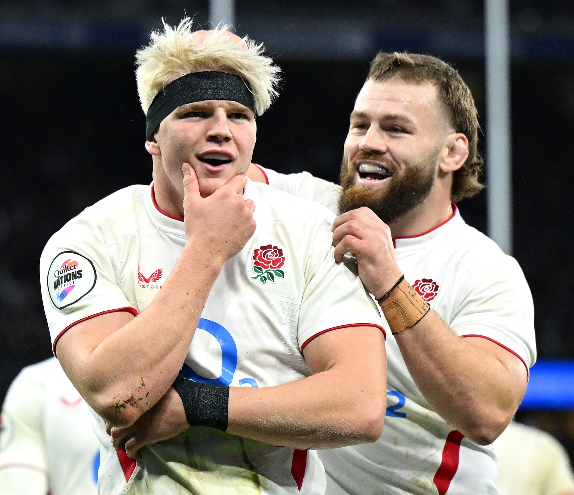Henry Pollock of England celebrates scoring his team's second try with teammate Luke Cowan-Dickie.
