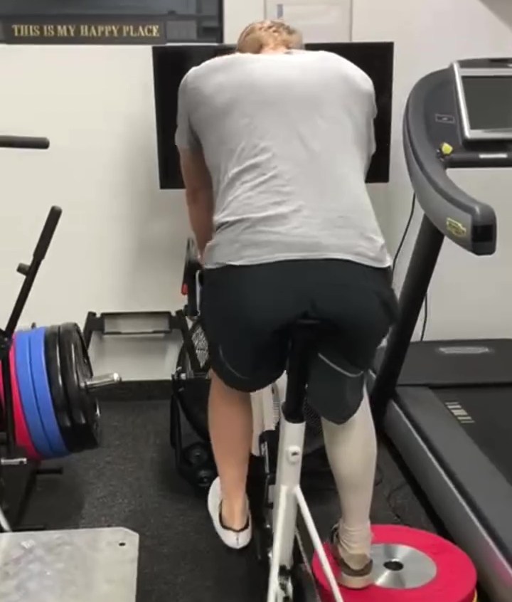 Sir Chris Hoy cycling with one leg two weeks after surgery.