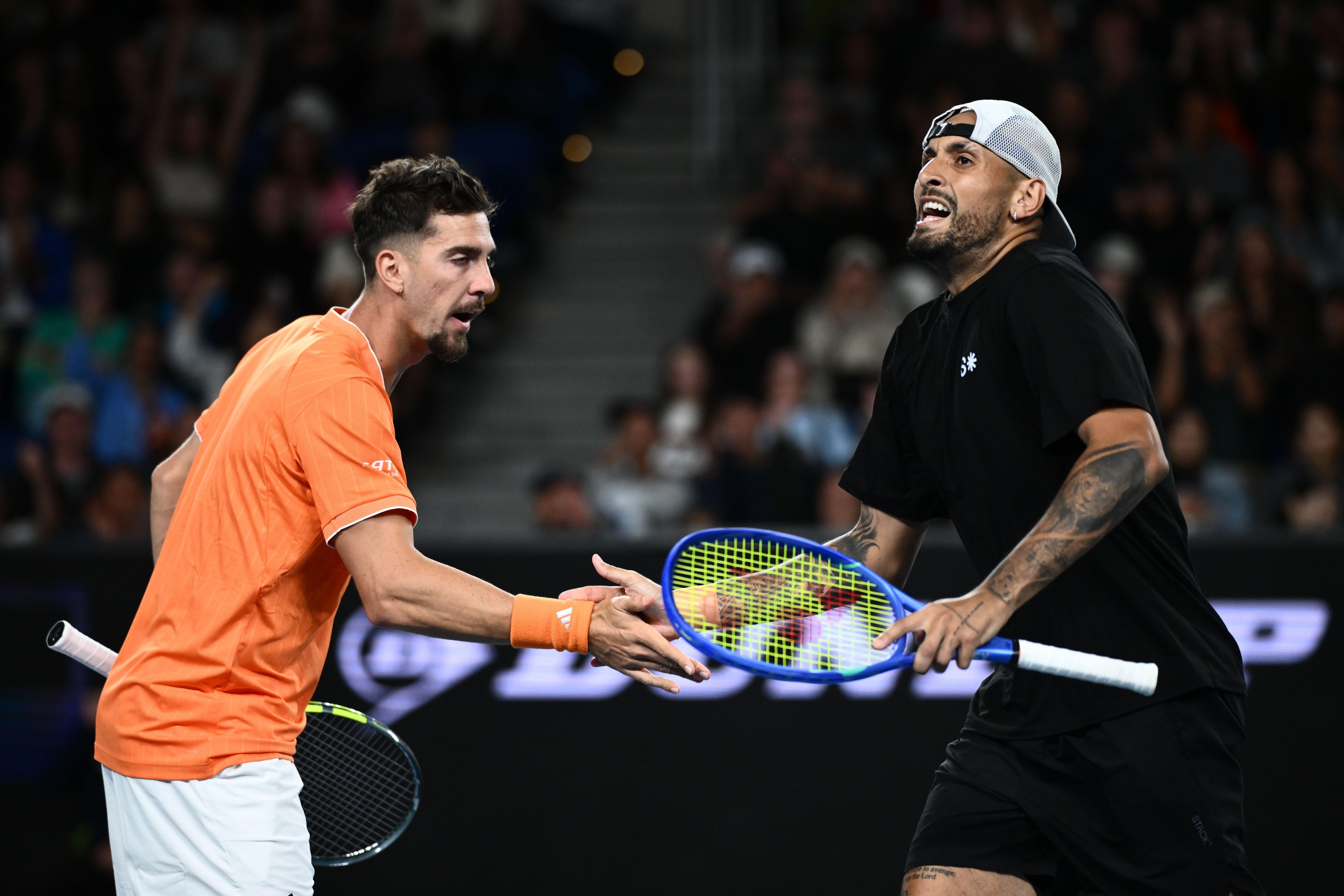 Nick Kyrgios and Thanasi Kokkinakis shaking hands after their Men's 1st round match at the Australian Open.