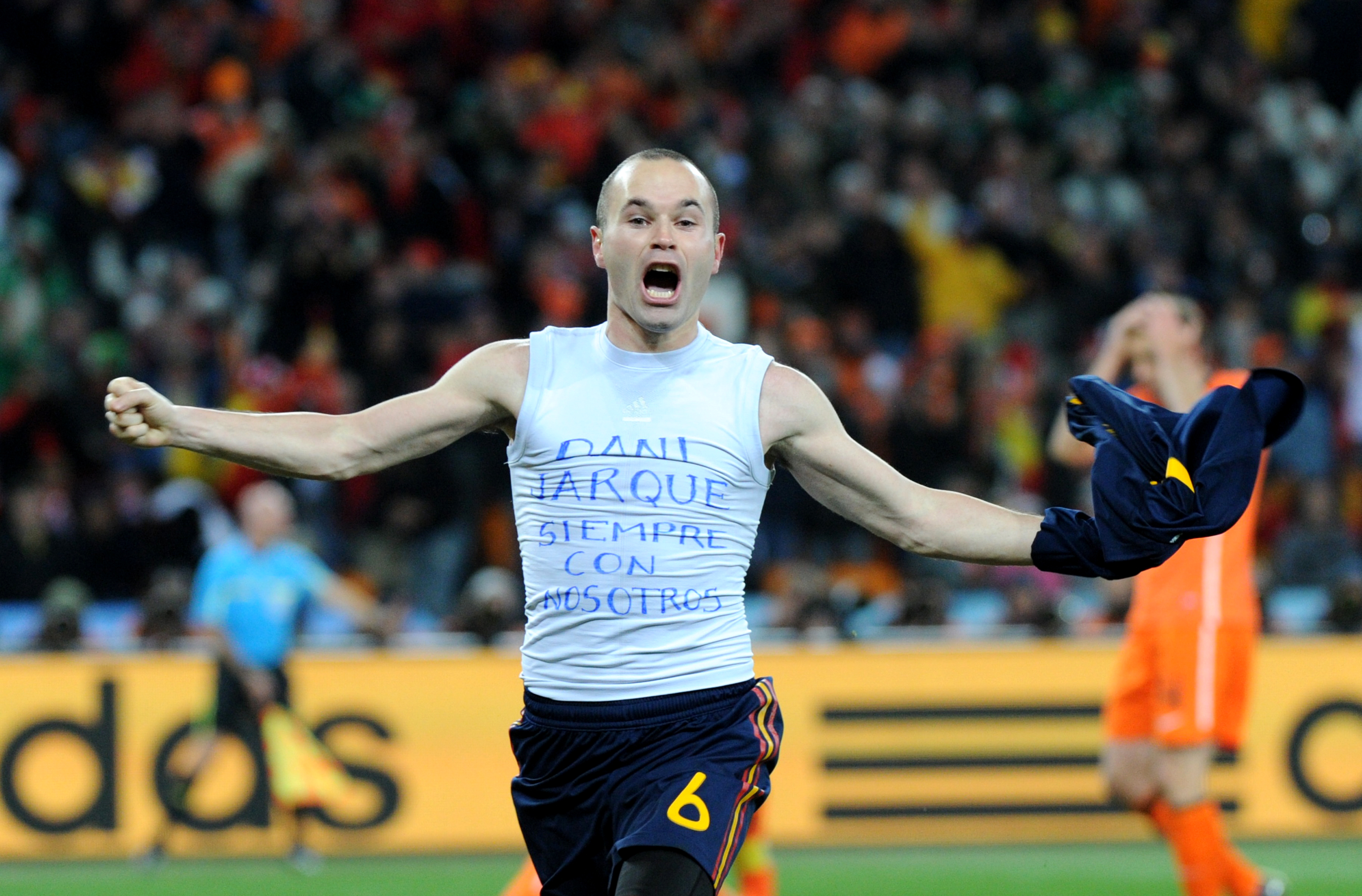 Spain's midfielder Andres Iniesta celebr