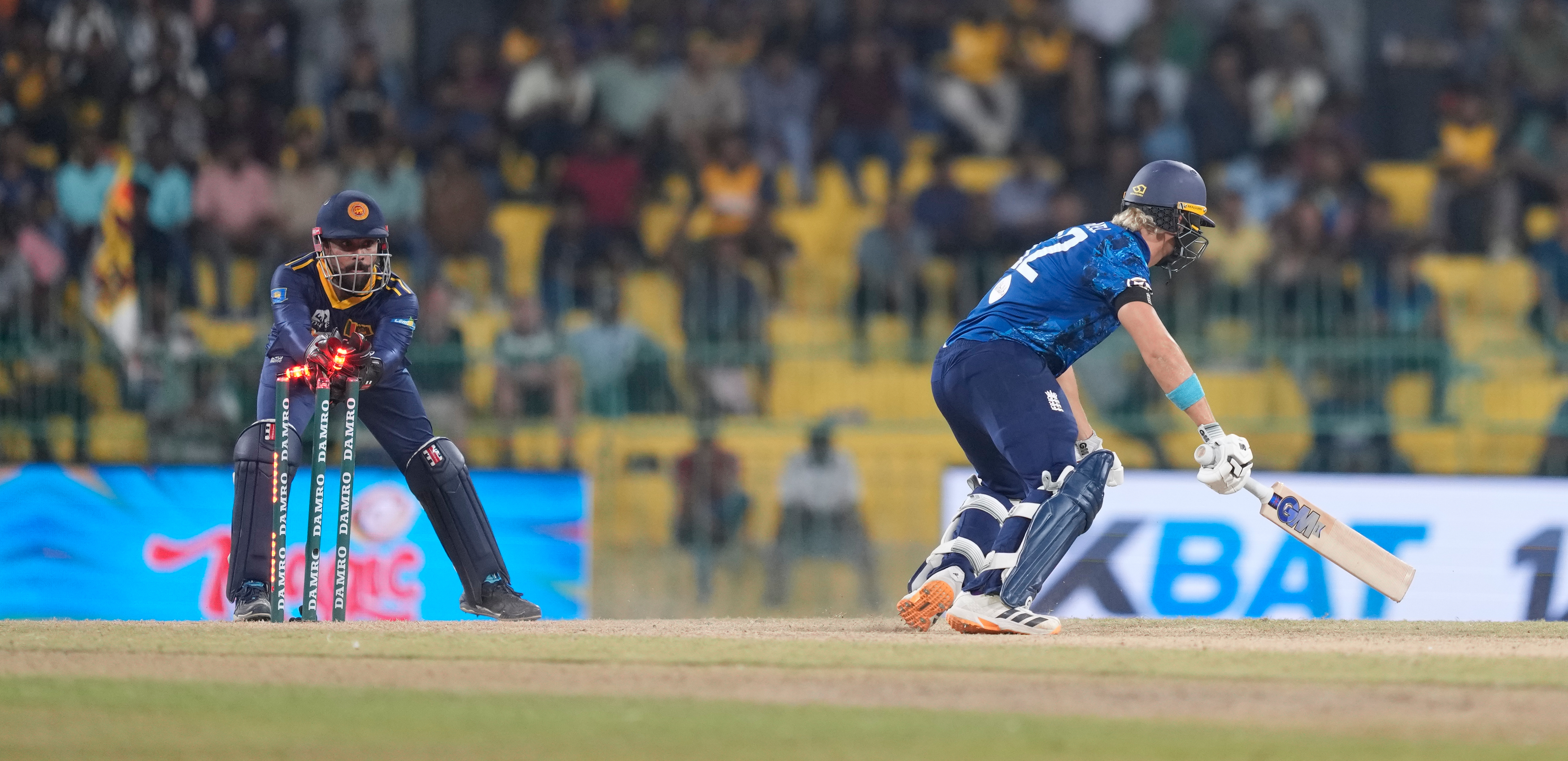 Sri Lanka's Kusal Mendis successfully stumps to dismiss England's Jacob Bethell during an ODI cricket match.
