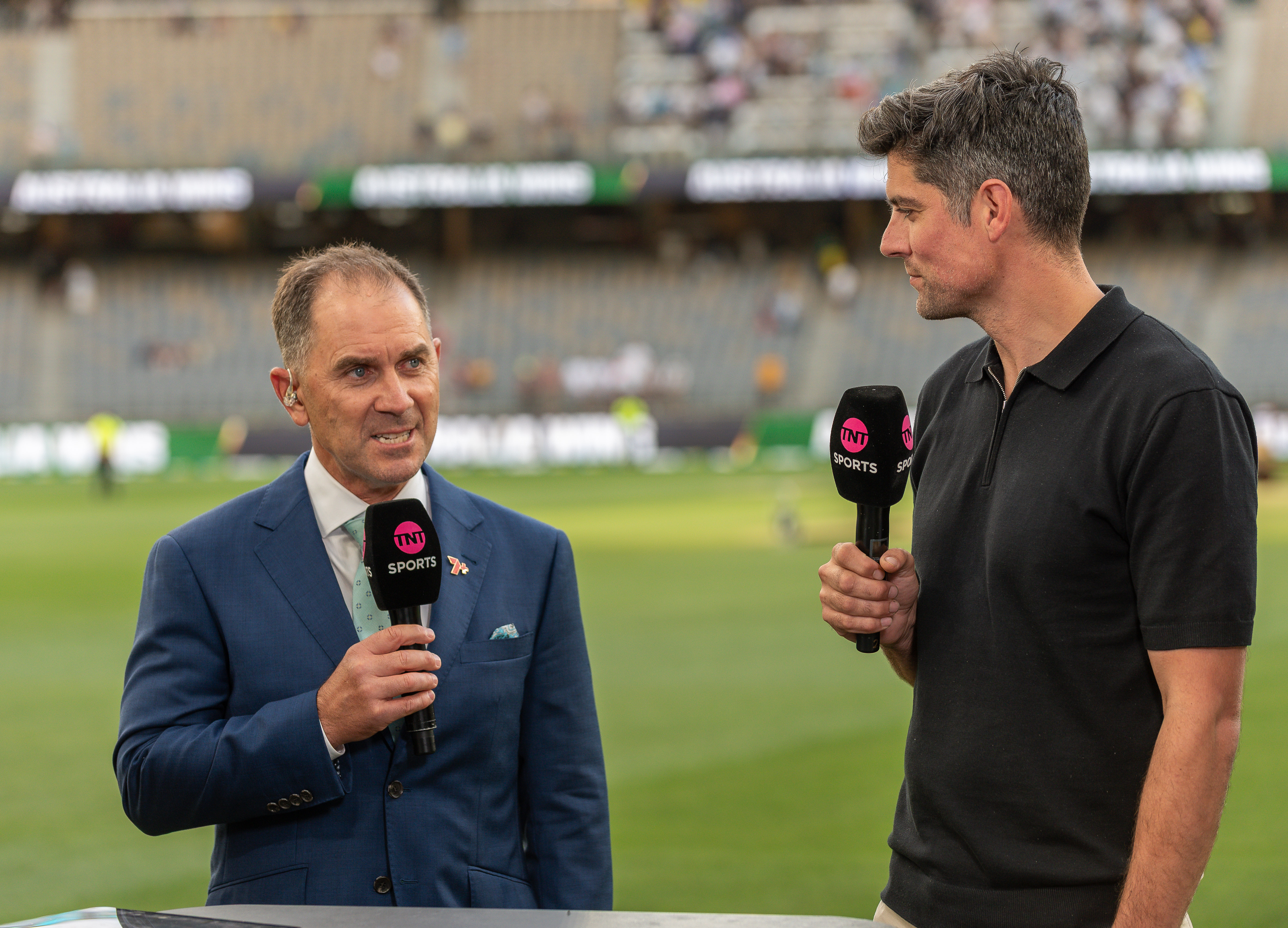 Justin Langer and Sir Alastair Cook discuss the cricket match.