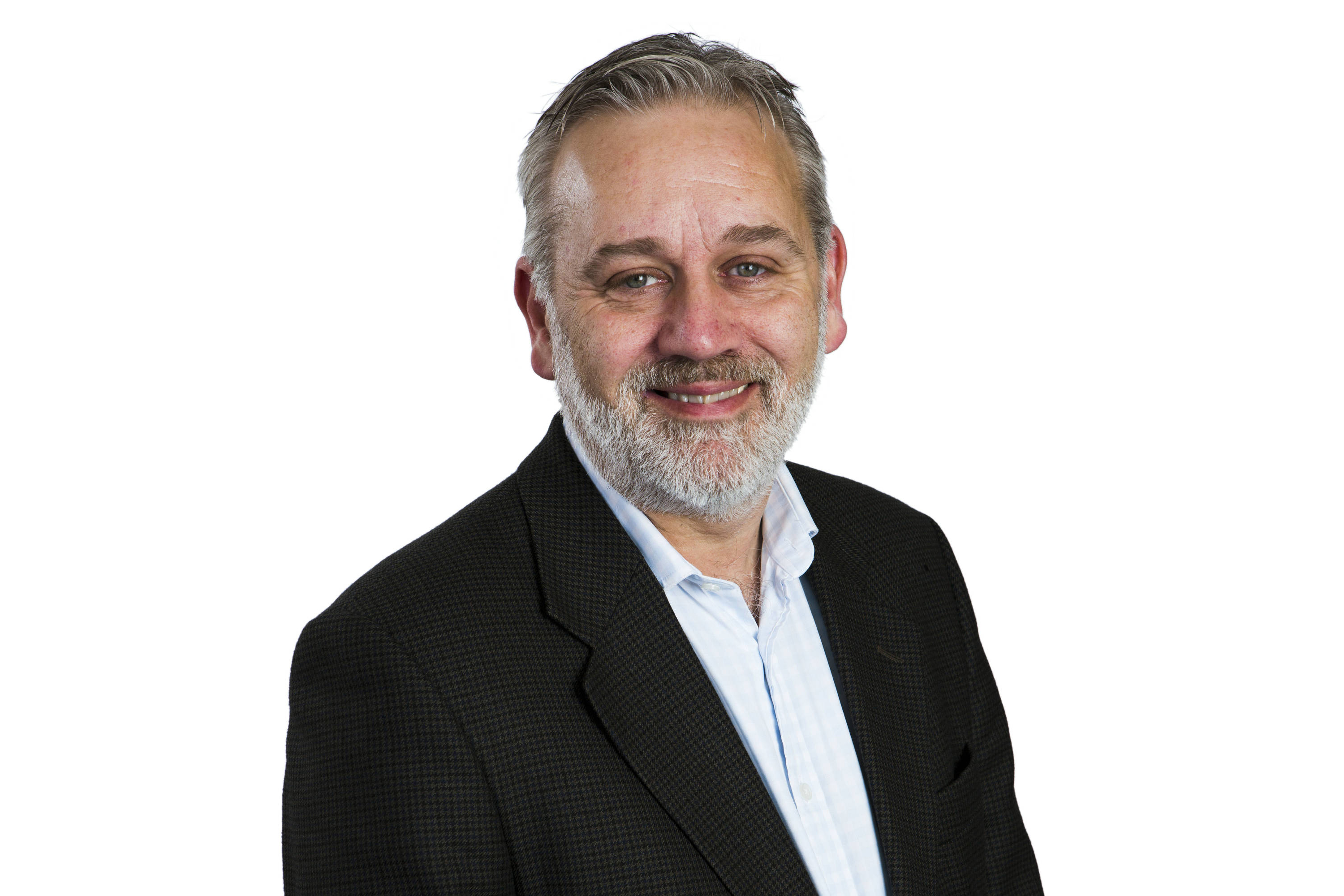 Malcolm Gomersall, CEO of Grant Thornton, smiling.