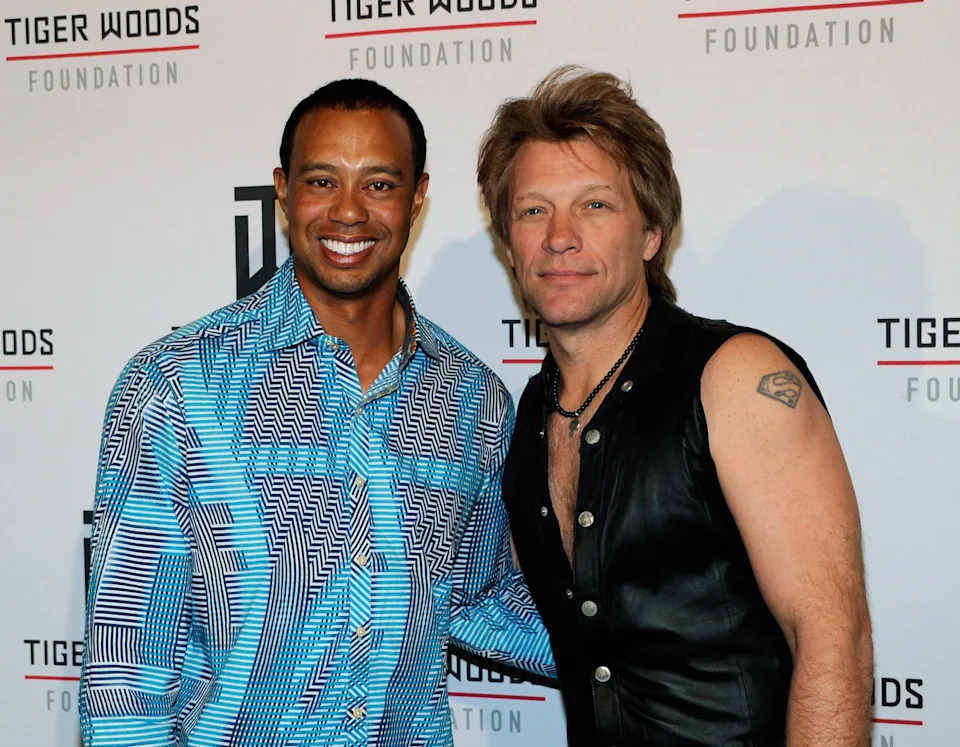 Tiger Woods (L) and recording artist Jon Bon Jovi appear at Tiger Jam 2012 at the Mandalay Bay Events Center in Las Vegas, Nevada.