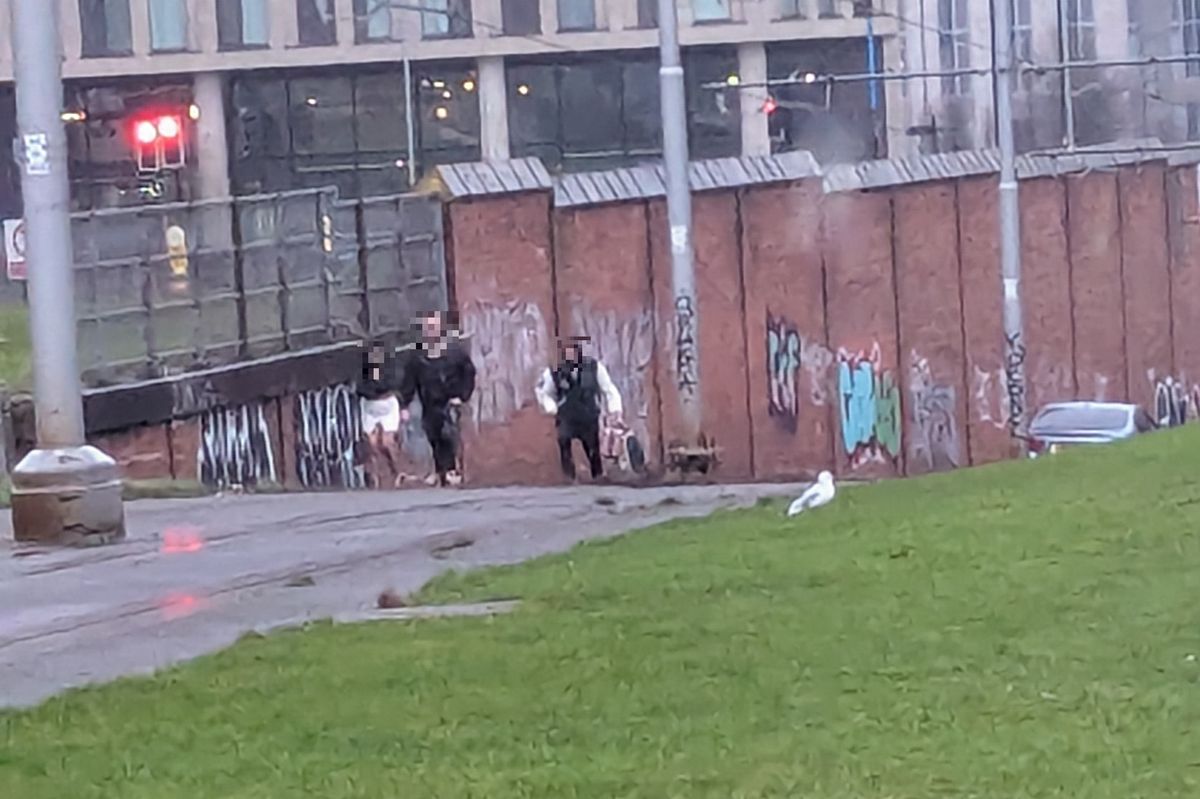 Three people were seen walking away from the car