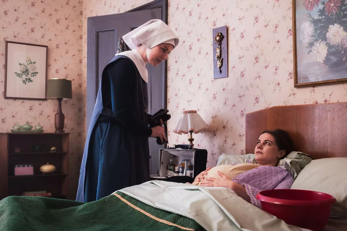 Call the Midwife character Thelma Cutler is seen in bed with a baby bump