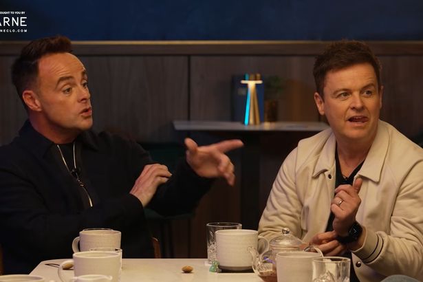 Ant McPartlin points towards Roy Keane. 