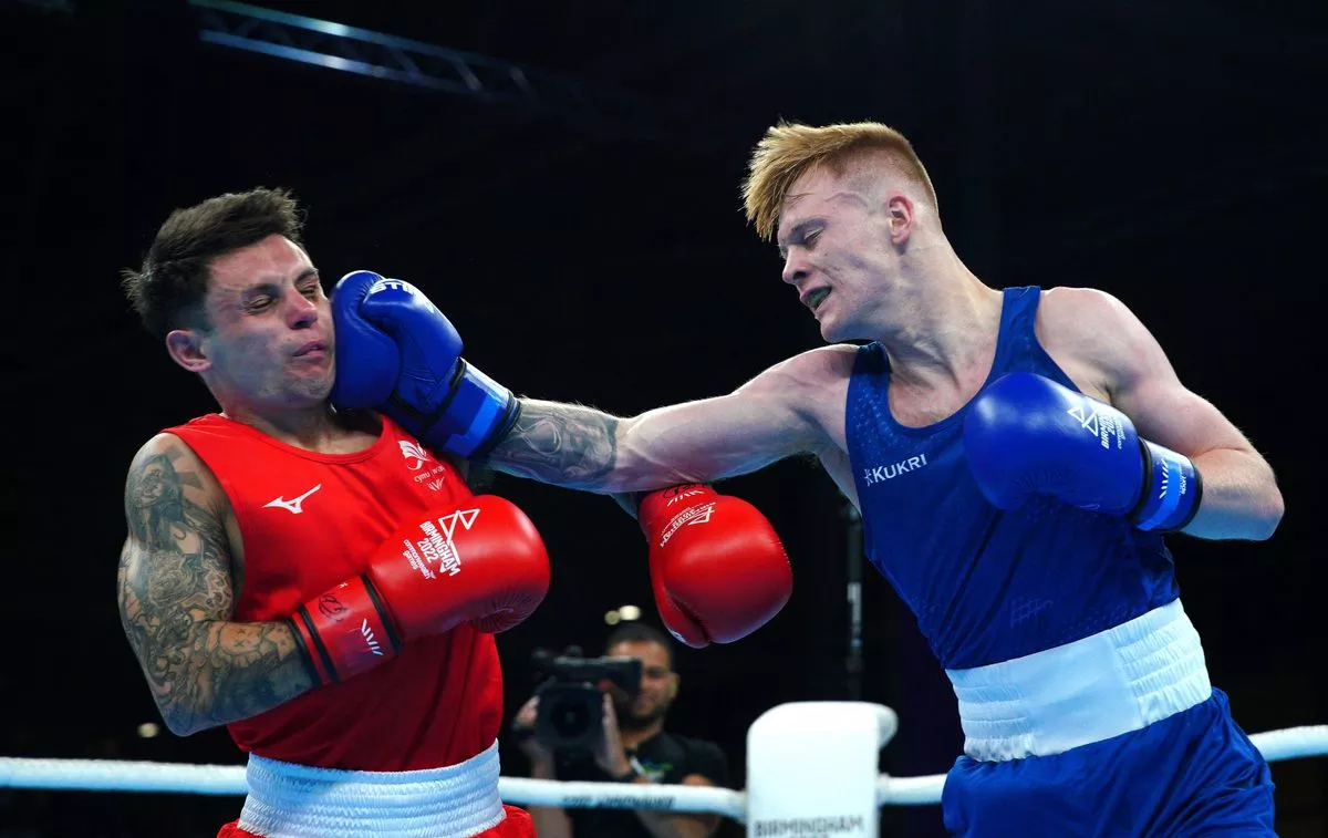Wales' Jake Dodd (Red) and England's Kiaran Macdonald (Blue) in the Men's Fly (48-51kg) Semi-Final at The NEC on day nine of the 2022 Commonwealth Games in Birmingham