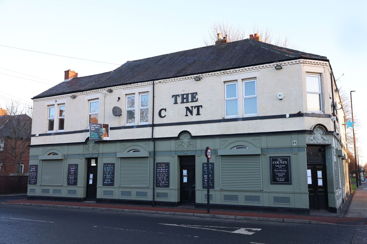 A closed pub with a broken sign reading 'The C N T'