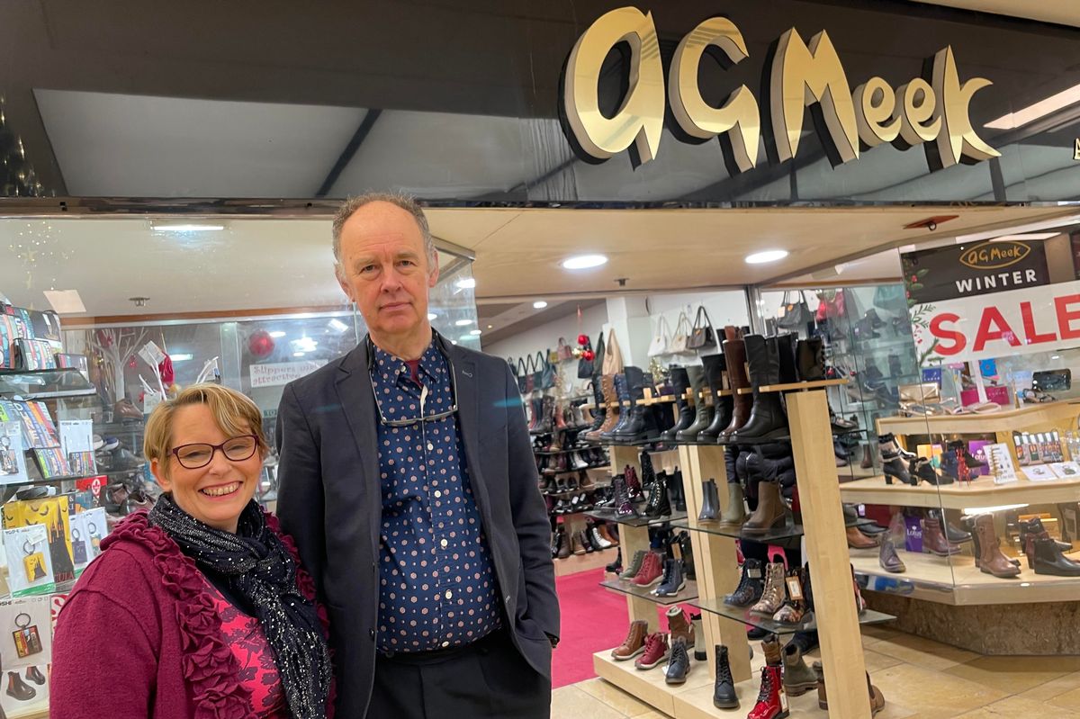 David Meek and Liz Meek outside the Cardiff branch of AG Meek
