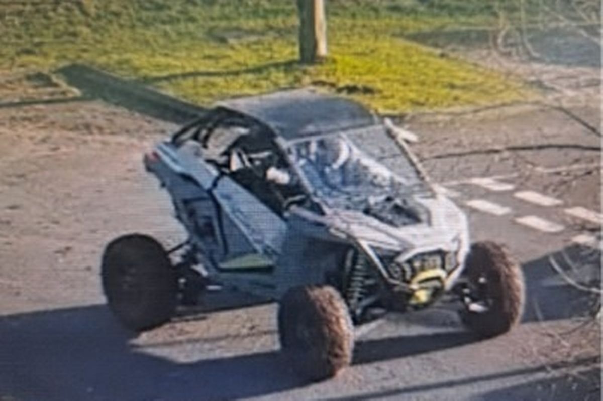 CCTV screenshot of grey dune buggy 