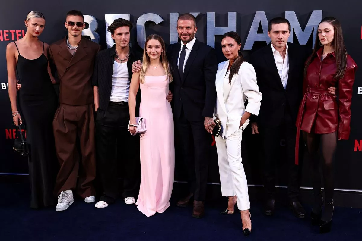 (FILES) Former England footballer David Beckham (5th L) and his wife Victoria Beckham (3rd R) pose on the red carpet with their children and partners, (from L) Mia Regan, Romeo Beckham, Cruz Beckham, Harper Beckham, Brooklyn Beckham and Nicola Peltz Beckham upon arrival to attend the premiere of "Beckham" in London on October 3, 2023. Brooklyn Peltz Beckham, son of the British celebrity couple David and Victoria Beckham, said he did not want to reconcile with his parents after a family rift he described in a lengthy post on social media on January 19, 2026. (Photo by HENRY NICHOLLS / AFP via Getty Images)