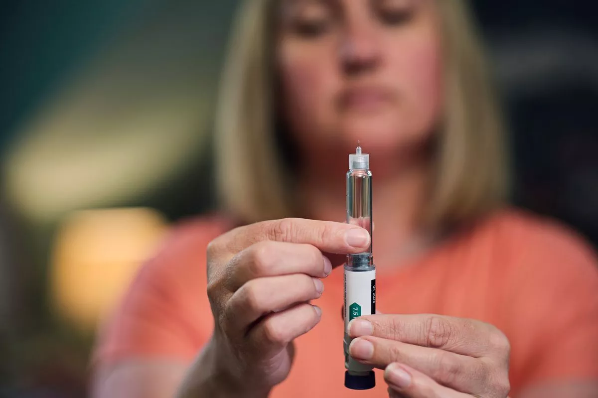 A woman with a weight-loss injection