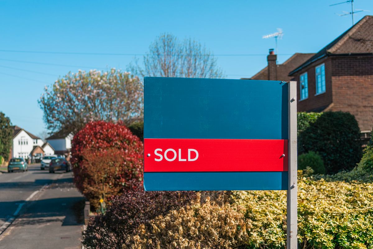 Houses and gardens in Manchester UK. Houses in England - sold sign