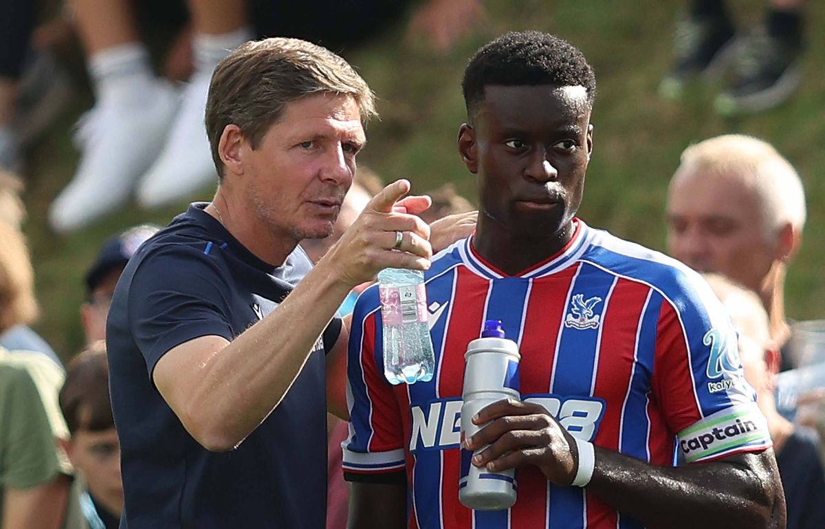 LINZ, AUSTRIA - AUGUST 1: Oliver Glasner Manager of Crystal Palace points out instructions to Marc Guehi of Crystal Palace during the pre season friendly match between Augsburg v Crystal Palace at Hofmaninger Stadium on August 1, 2025 in Linz, Austria. (Photo by Crystal Pix/MB Media/Getty Images)