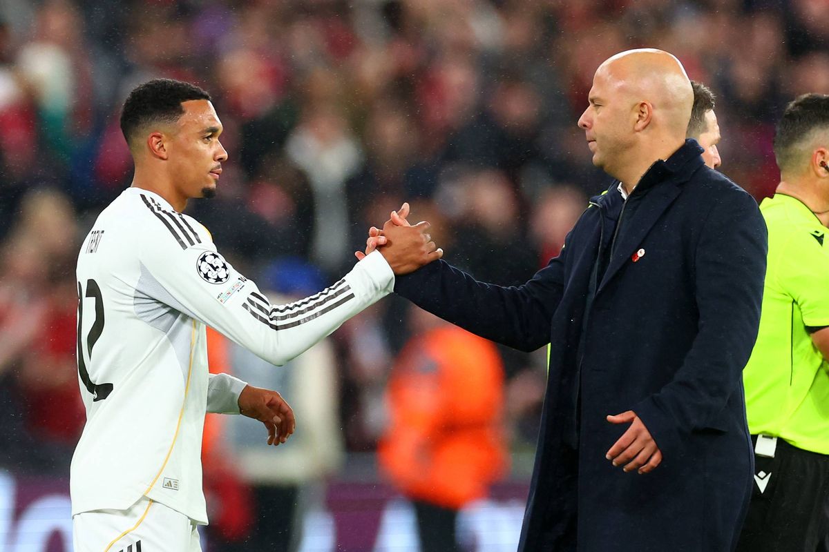 Trent Alexander-Arnold shakes hands with Arne Slot after Liverpool's win over Real Madrid