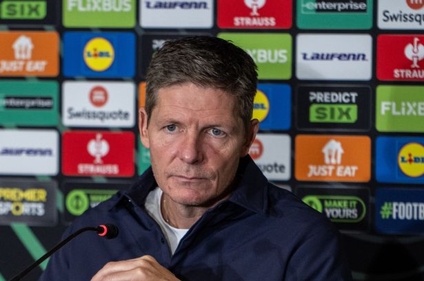 Oliver Glasner sits down with the media.