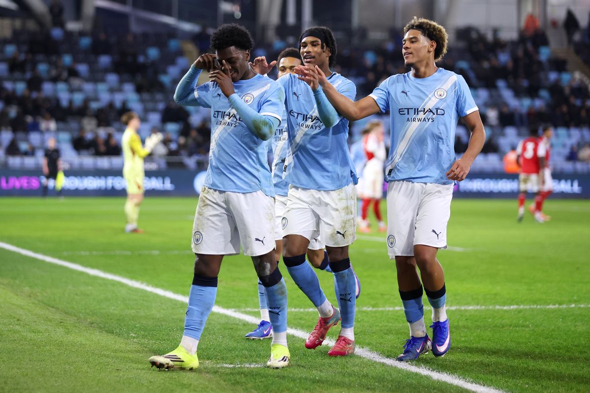 Xavier Parker of Manchester City celebrates scoring his team's fifth goal during the FA Youth Cup Fourth Round match between Manchester City and Arsenal at Joie Stadium