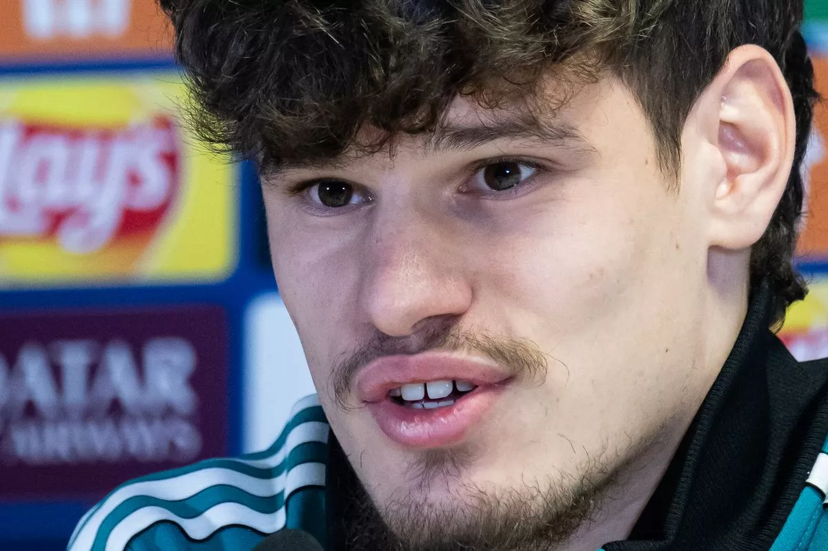 Liverpool Milos Kerkez speaks during a press conference at the Stade Vélodrome in Marseille