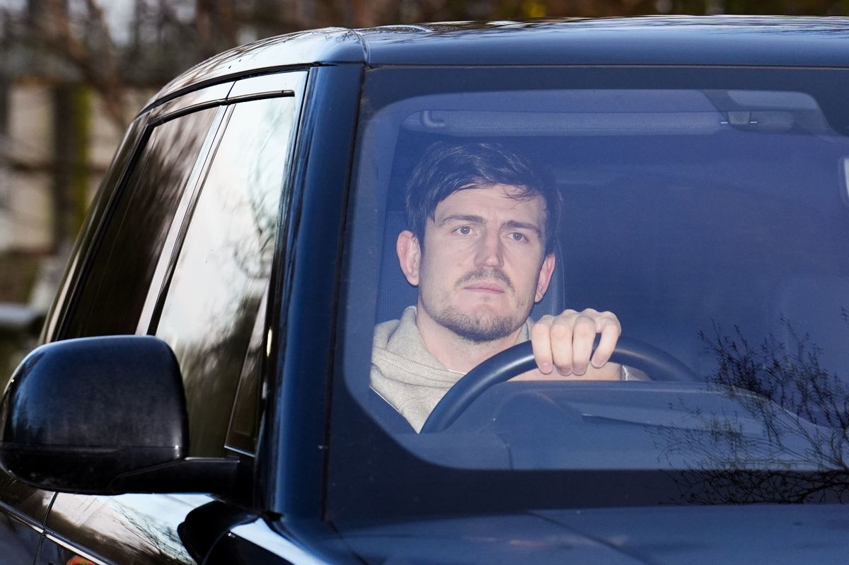 Harry Maguire arrives for a Manchester United training session at the club's Carrington base
