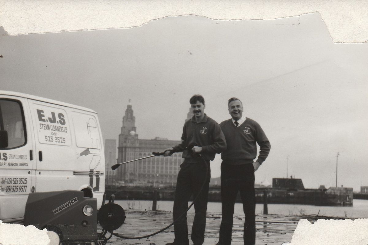 Eric in front of the Liver Buildings
