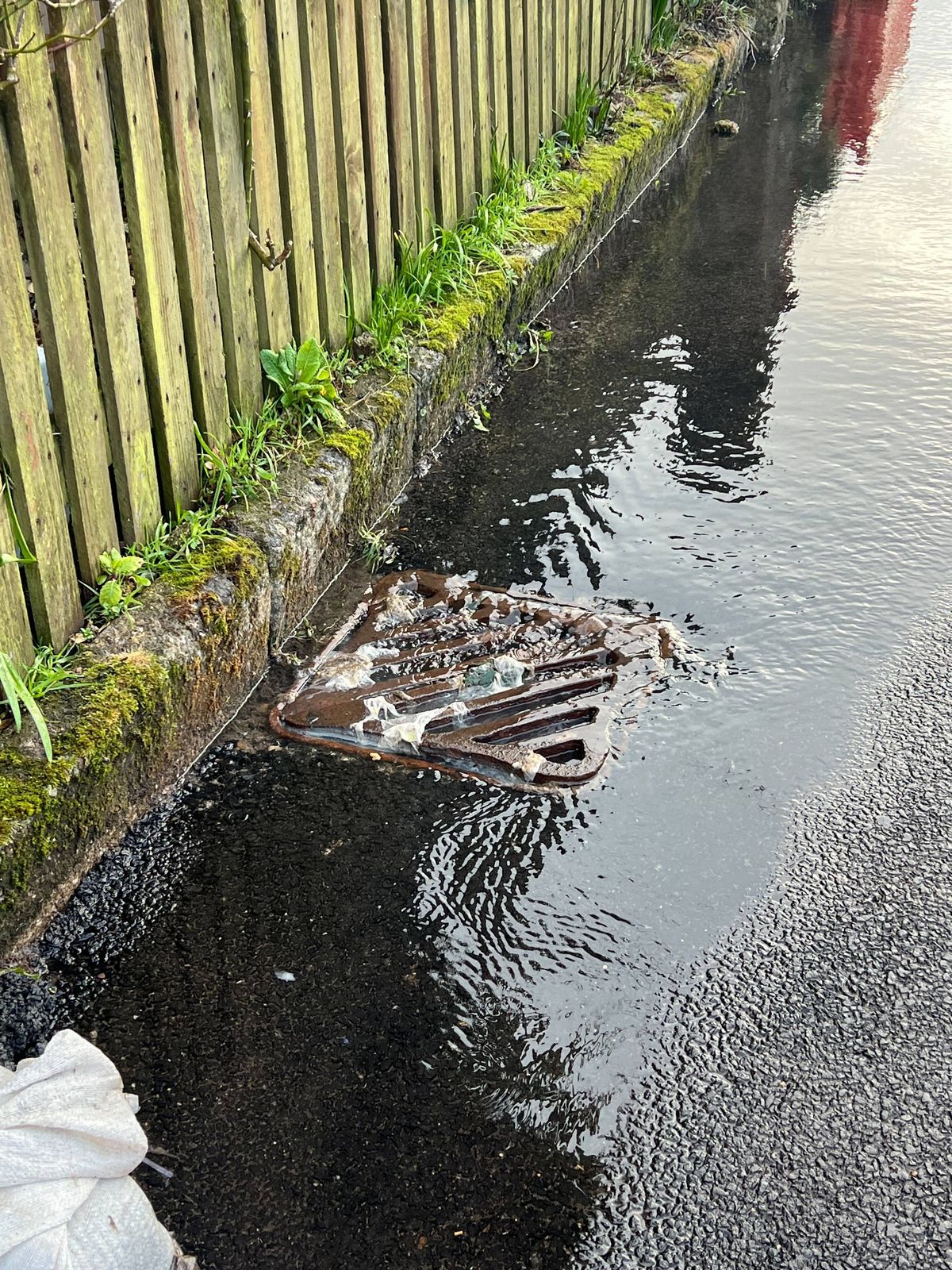 Raw sewage full of human faces, sanitary products, toilet paper and even hypodermic needles flowing past people's sandbagged homes in Stithians or pooling in a lake of poo outside their homes