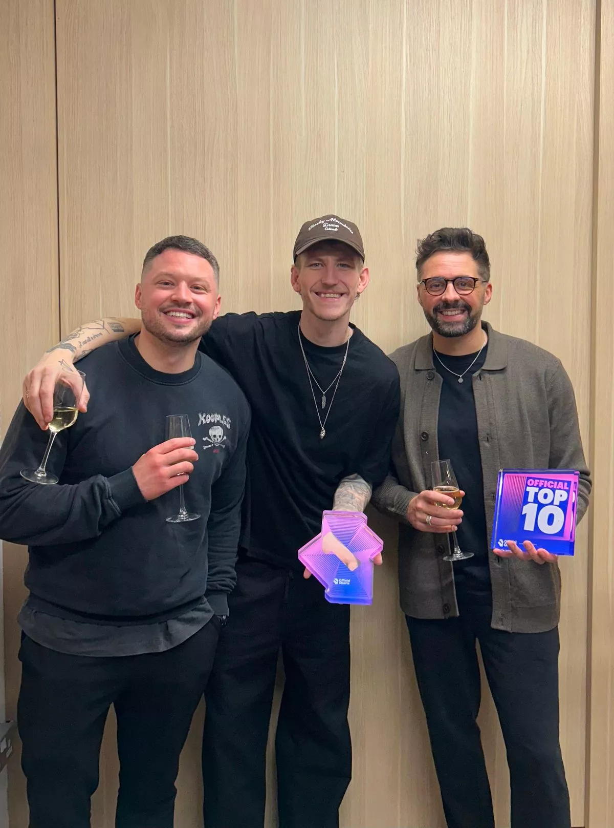 Nathan Evans and the Saint PHNX Band celebrating chart success