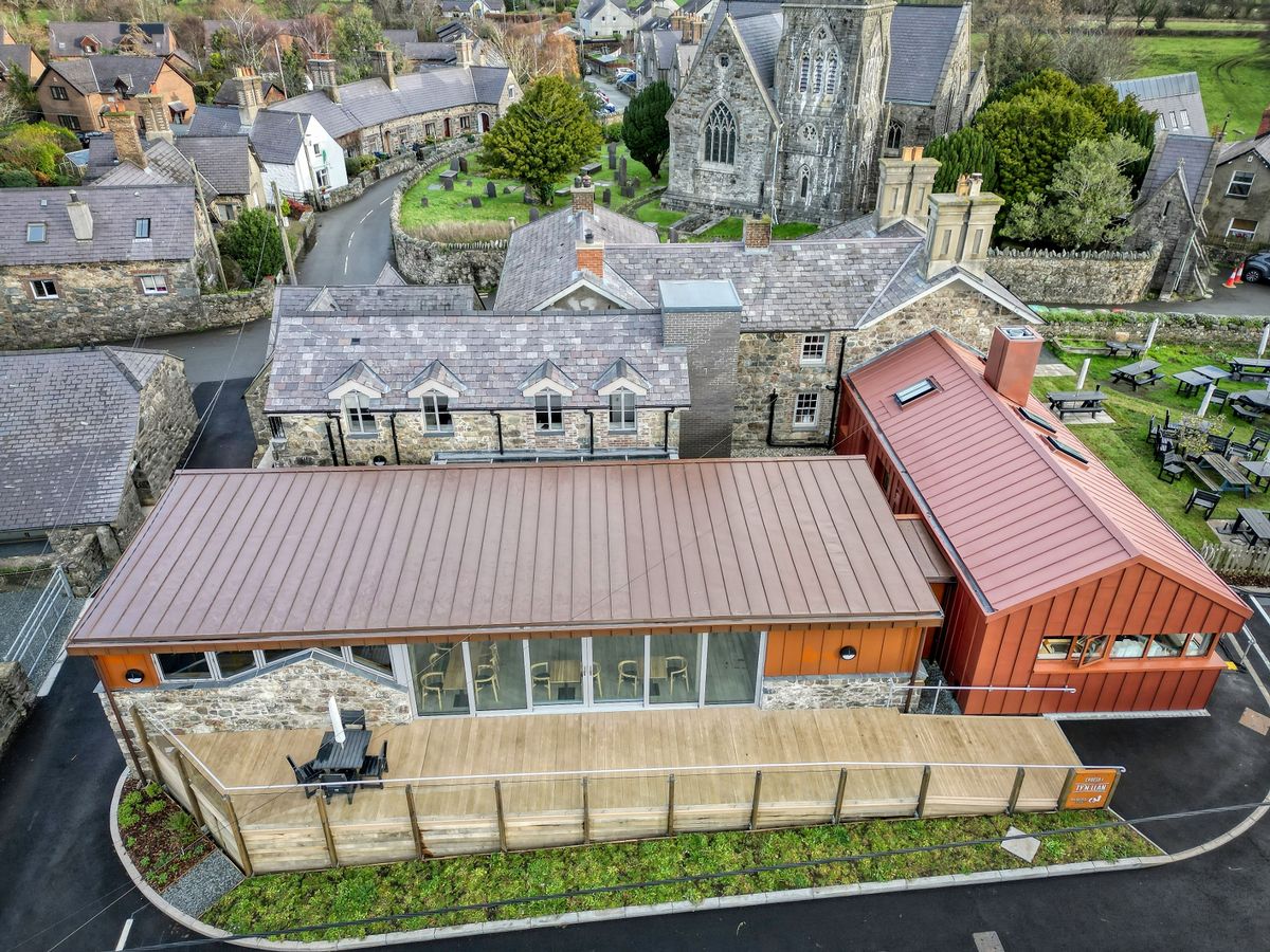 The renovation, conversion and transformation of T'yn Llan commnity pub in Llandwrog, Gwynedd this is the new build extension with restaurant, catering kitchen, facilities and community room - this is an aerial view