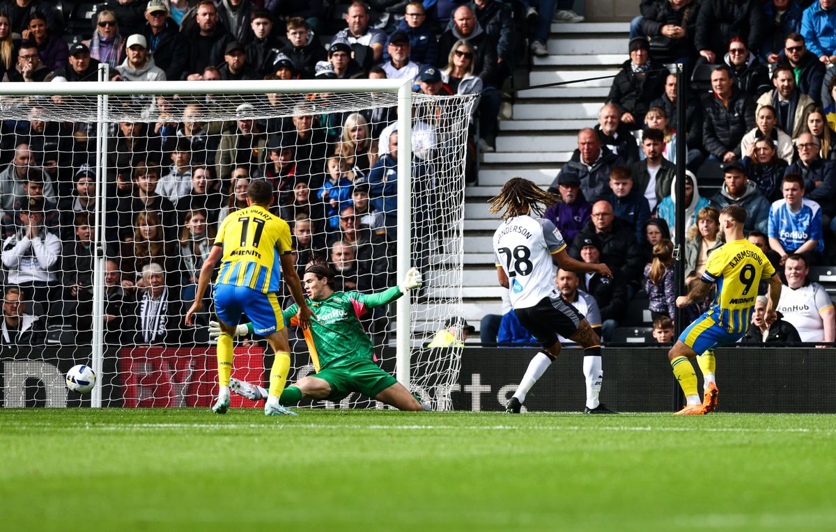 Adam Armstrong of Southampton scores against Derby County