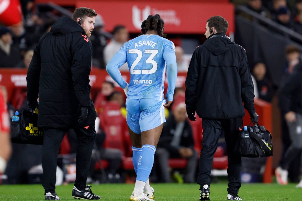 Coventry City's Brandon Thomas-Asante (centre) leaves the pitch with an injury during the Sky Bet Championship match at the Riverside Stadium, Middlesbrough.