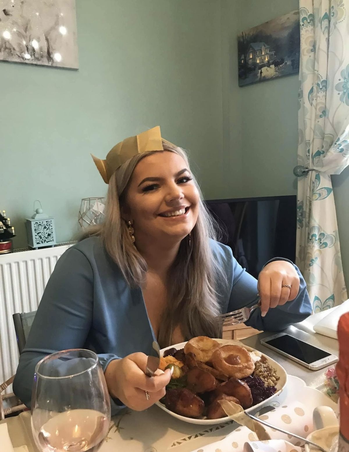 Bella, pictured at Christmas, continues to remain optimistic 