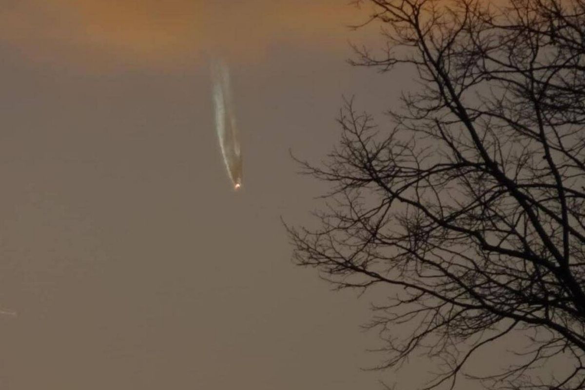 A burning light falling from the sky