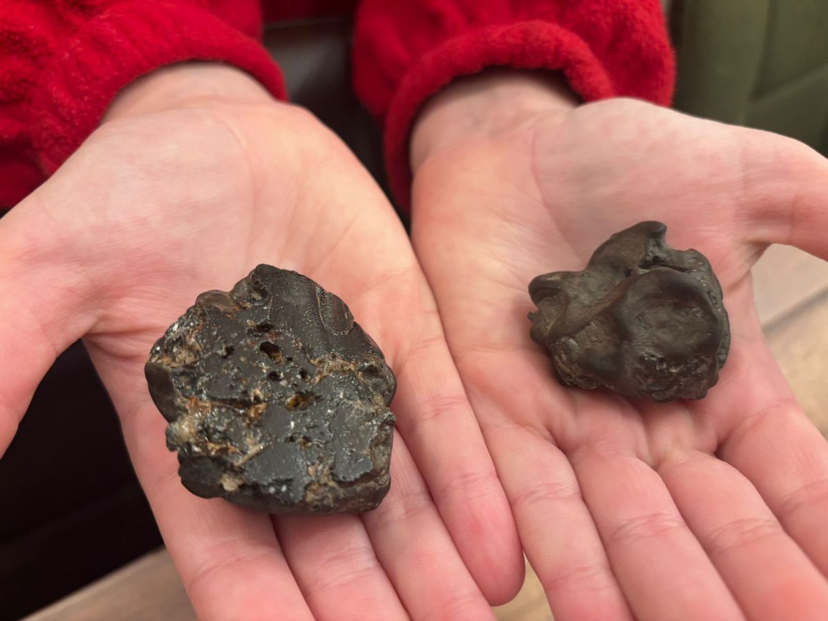 Two large stones in small hands