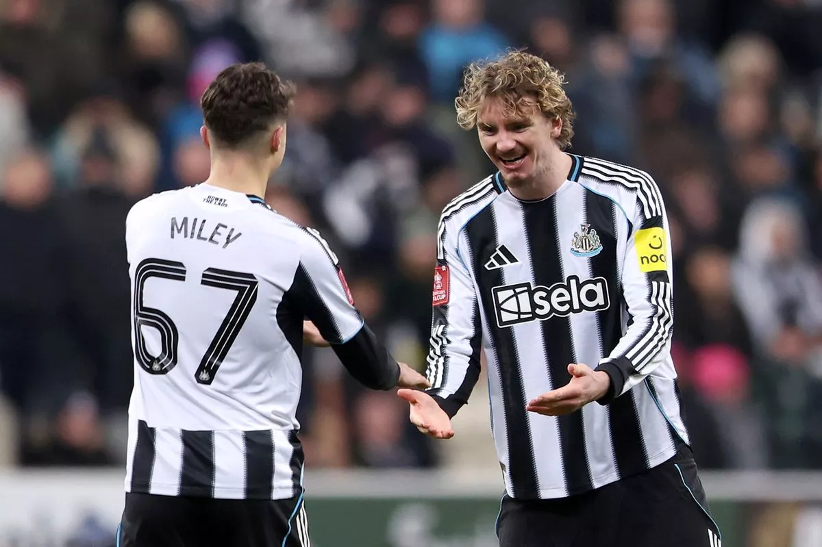 Lewis Miley and Nick Woltemade of Newcastle United