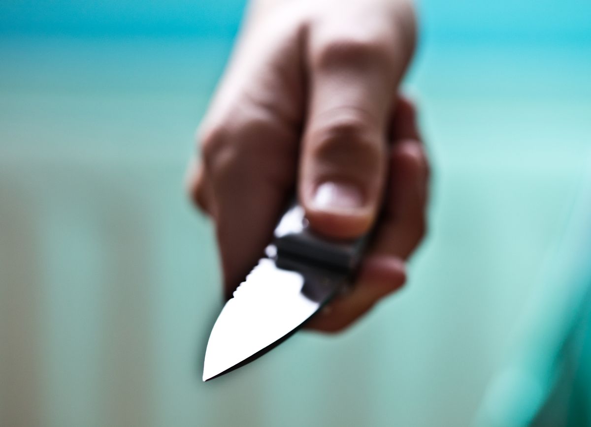 A general image of a someone holding a knife