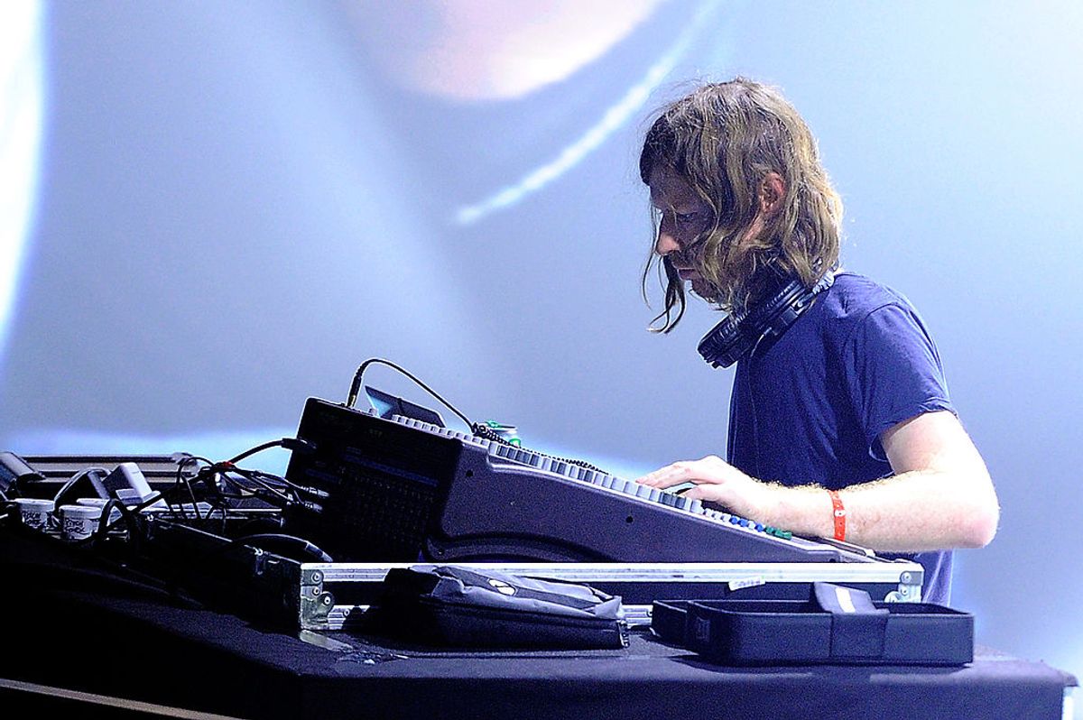 Aphex Twin performs on stage during day one of the Pitchfork Music Festival at the Grande Halle de La Villett