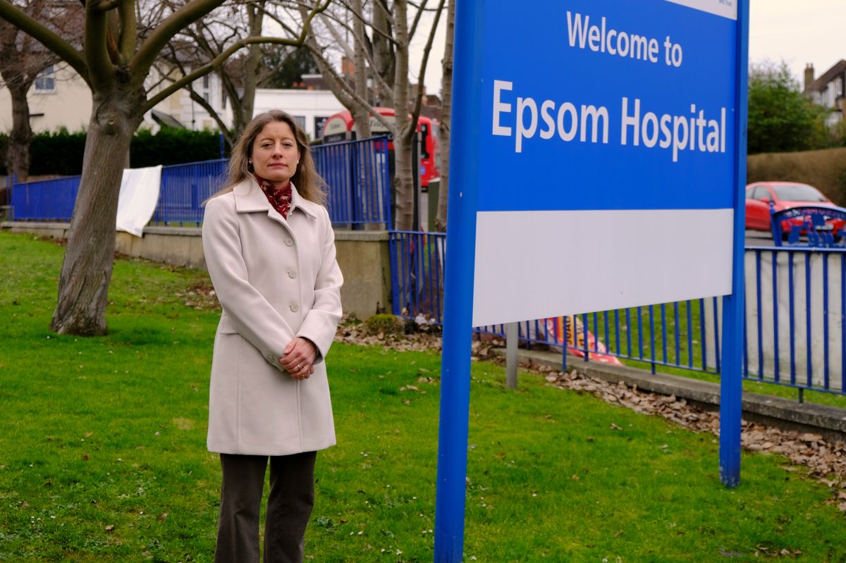 Liberal Democrat MP for Epsom & Ewell, Helen Maguire standing outside Epsom Hospital